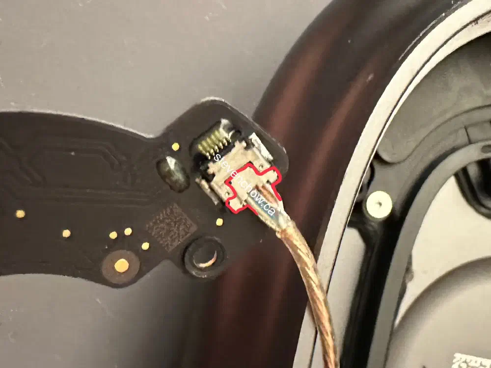 Step 8: Disconnect headband connector cable from main board.
